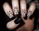 Маникюр:4 леопардовых ногтя и один черный