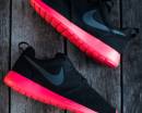 Черные кроссовки Nike с красной подошвой