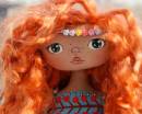 Кукла с рыжими кудрявыми волосами