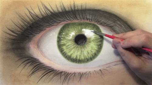 гиф Художник рисует зелёный глаз